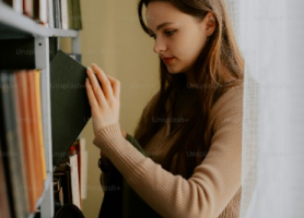 Woman choosing a book